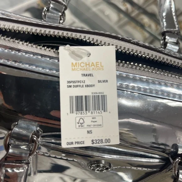 MICHAEL KORS Jet Set Small Patent Duffel Xbody Crossbody Bag
Silver 
NWT - Picture 9 of 16